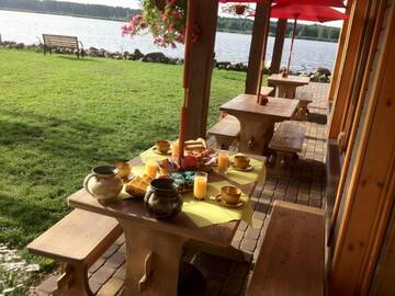 Фото номера Четырехместный номер с видом на сад Гостевой дом Guest House Jurmala г. Юрмала 11