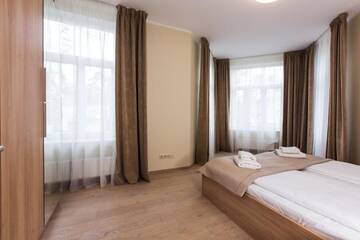 Фото номера Апартаменты с 2 спальнями и балконом Апарт-отели Katrin Apartments г. Юрмала 9