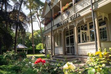 Фото Апарт-отели Wooden Villa г. Юрмала 1