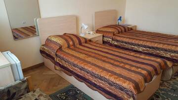 Фото номера Кровать в двухместном номере с 2 отдельными кроватями Санаторий Санаторий Янтарный Берег г. Юрмала 2