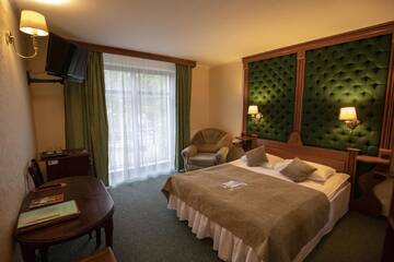Фото номера Улучшенный двухместный номер с 1 кроватью Отель Pegasa Pils Spa Hotel г. Юрмала 3