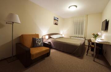 Фото номера Стандартный трехместный номер Апарт-отели Dzintars Hotel г. Юрмала 10