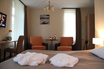 Фото номера Семейный люкс Апарт-отели Dzintars Hotel г. Юрмала 6
