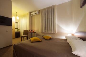 Фото номера Двухместный номер эконом-класса с 1 кроватью Апарт-отели Dzintars Hotel г. Юрмала 3