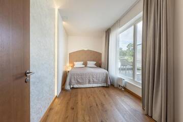 Фото номера Роскошные апартаменты с 2 спальнями и доступом в сауну Отель Villa St Maria г. Юрмала 7